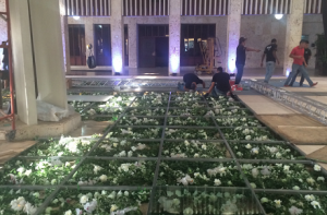 setting up the flower filled dance floor